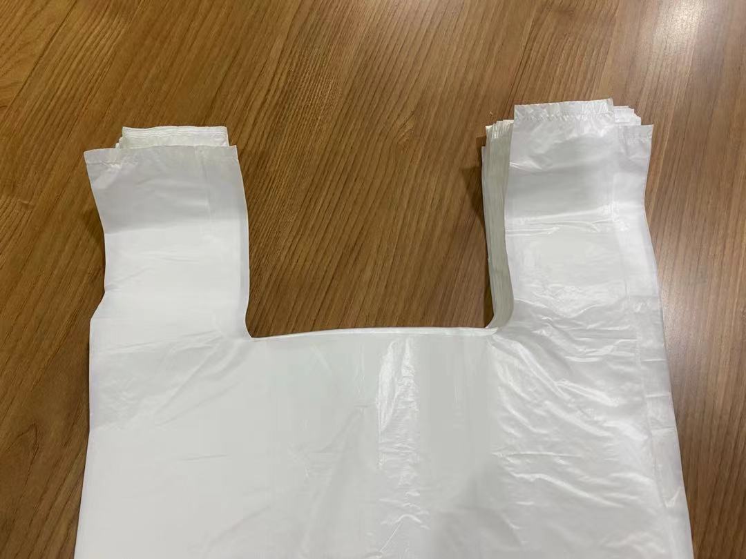 sacola plástica de camiseta para embalagem de alimentos e vegetais